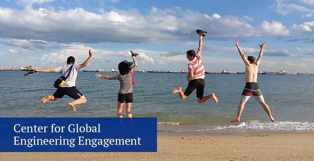 study abroad students on a beach